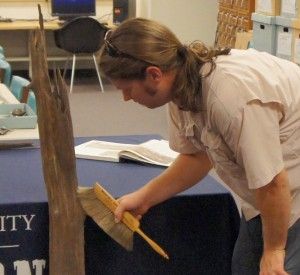 Photo by: Chad KenneyMatt Newberry prepares a wooden post from Camp Lawton for conservation. This post was part of the stockade wall and is 150 years old.