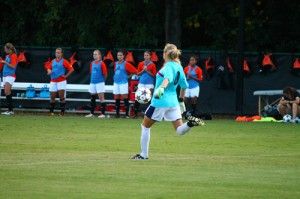 Junior goalkeeper Molly Williams (0) clears the ball up the field. Williams made her debut in goal against Samford University last month.Photo by: Ryan Woodham