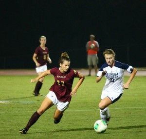 Sophomore midfielder Gabby Watson (17) races Elon University senior forward Chelsey Stark (27) for possession of the ball. The Eagles will battle Furman University in a pivotal Southern Conference matchup.Photo by: Ryan Woodham