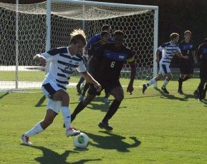 Freshman forward Jeremy Rector (25) possesses the ball and begins the offensive attack.Photo by: Heather Yeomans