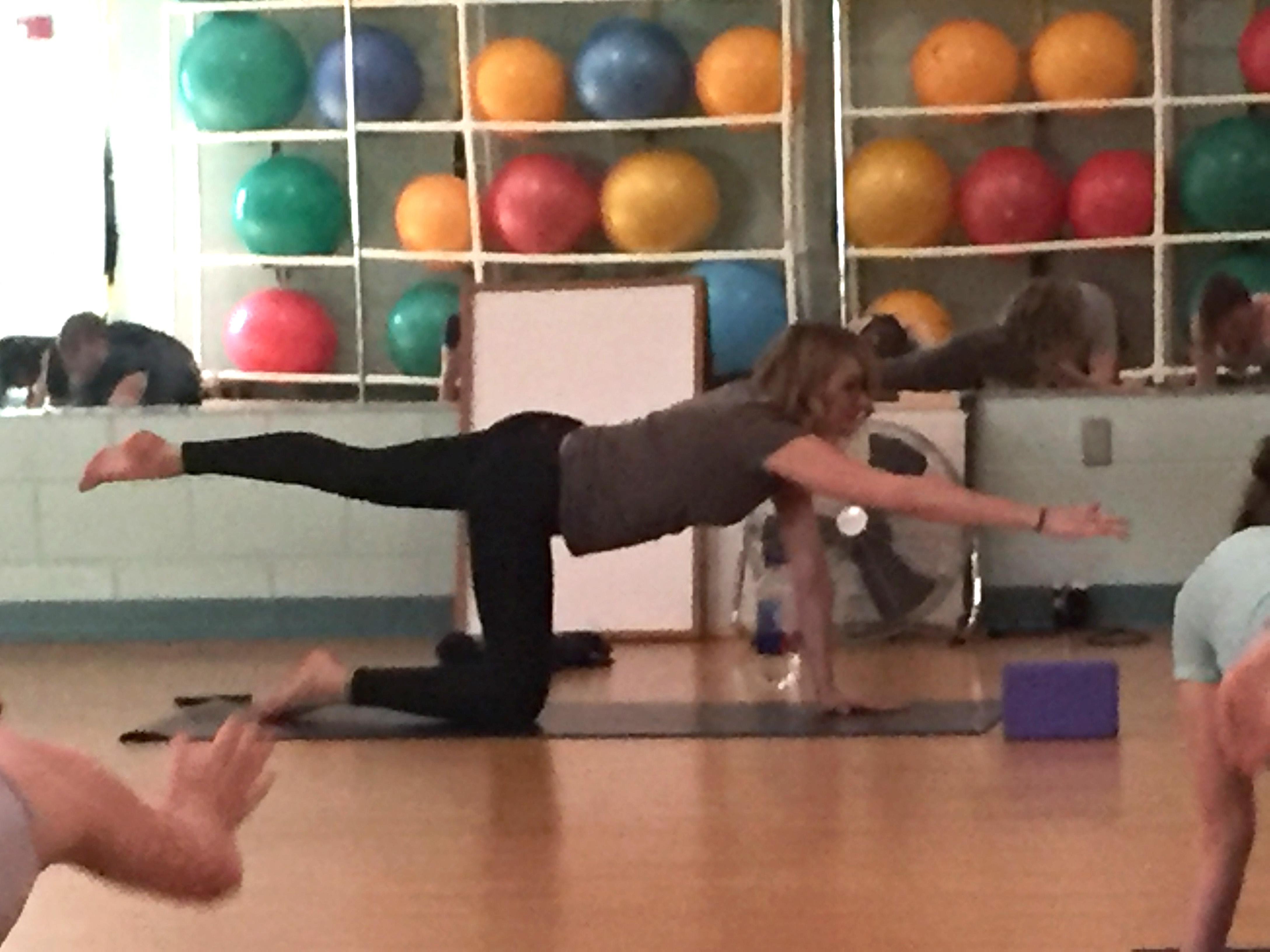 web Stori Springman demonstrating Balancing Table pose in her afternoon yoga class in the Armstrong Recreation Center Tuesday March 29, 2016