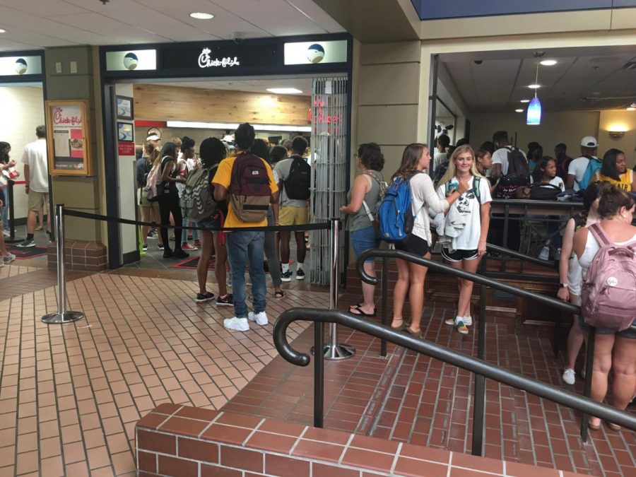 Students+wait+for+their+food+in+the+dining+area+of+Chick-Fil-A.%C2%A0