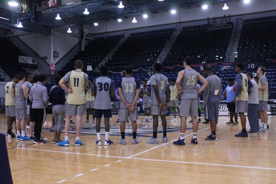 The Eagles gather last preseason in Hanner Fieldhouse. They return all five starters including guards Mike Highes (far left, No. 2) Ike Smith (far right, No. 3).