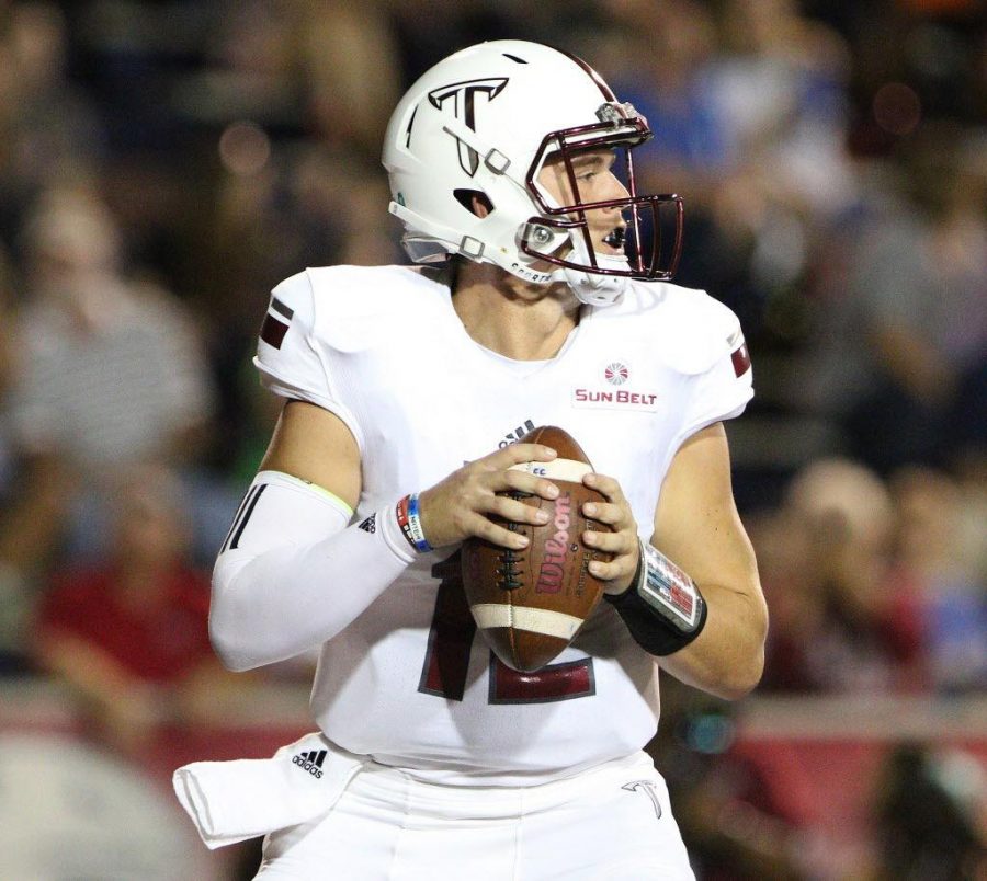Troy quarterback Brandon Silvers looks for a receiver against South Alabama.