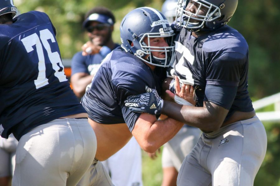 GS left tackle Tommy Boynton drives a teammate back in a practice this fall. Boynton and the Eagles offensive line have a challenge on Wednesday with last seasons Sun Belt Player of the Year in Arkansas States JaVon Rollan-Jones