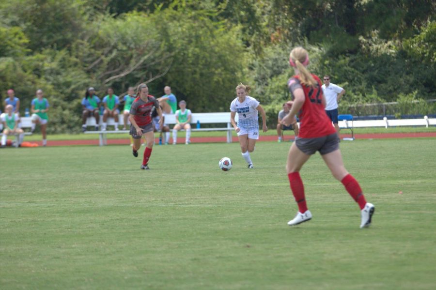 GS senior Sarah Price controls the ball in a game earlier this season. Price finished the year with four foals after scoring twice this weekend in a win over Troy.