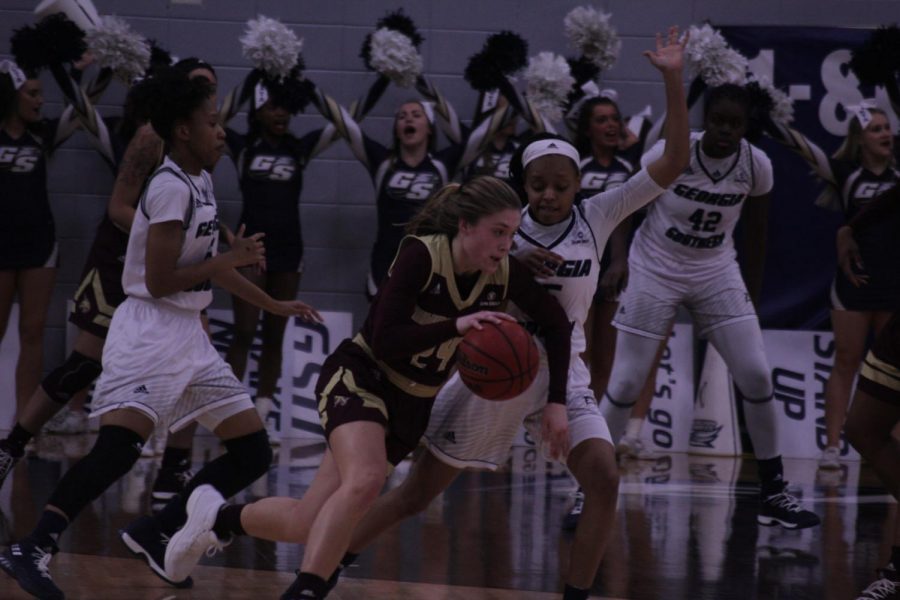 Sophomore guard Amira Atwater defends against a Texas State player.