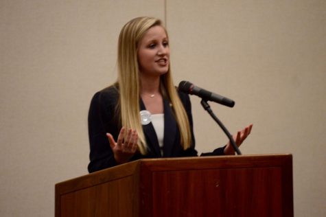 SGA Presidential candidate Macie Joyner answers questions at the debate. 