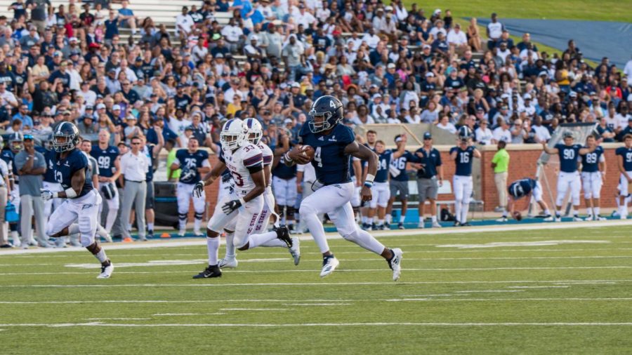 Redshirt-sophomore quarterback Shai Werts ran to the left to score a 23-yard touchdown against South Carolina State. Werts had three rushing touchdowns on the night. 