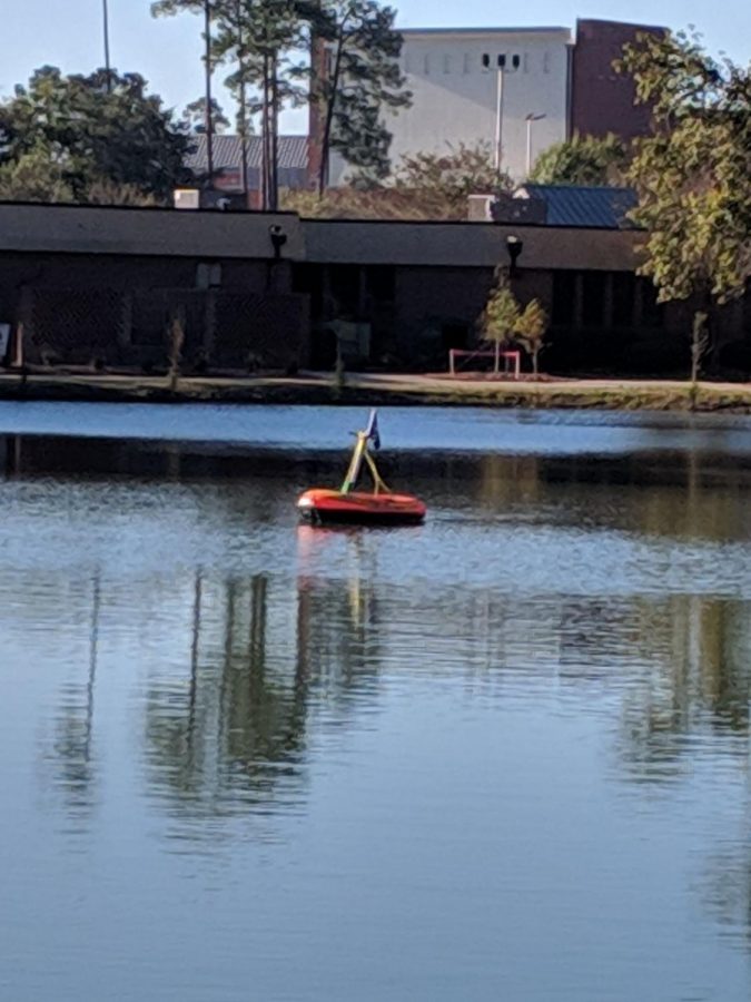 Students woke up Monday morning to find a makeshift pirate ship with a Lime scooter on it floating in Lake Ruby. This is not the first incident involving a Lime product as a bike was found in a tree by the University Bookstore and another scooter was found on the Carroll Builidng. 