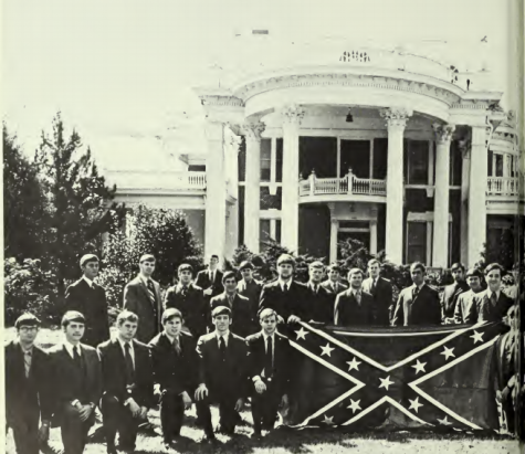 Fraternity members of Kappa Alpha are posed with a rebel flag outside of their building. The names the men in the picture can be found in the 1970 Reflector yearbook on digitalcommons.georgiasouthern.edu