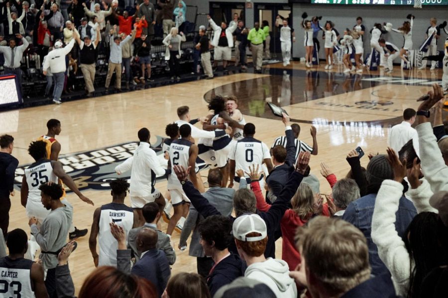The team stormed the court after redshirt-sophomore guard Quan Jackson hit a last-second buzzer beater shot for the win over ULM last season.