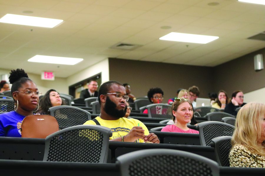 Students listening intently as the candidates answer questions. Photo by KeeAra Smith. 