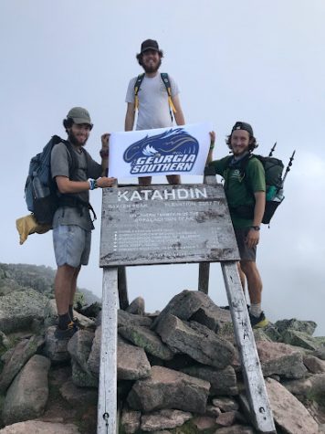 Wilson Calhoun (left), Dillon Calhoun and Christian Scott overlook the top of Mount Katahdin, their last stop on their 4-month long journey along the Appalachian trail. The hikers completed the trail July 15, 2021.
