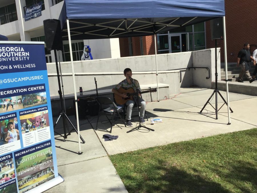 Duncan Sligh performing at the Farmers Market