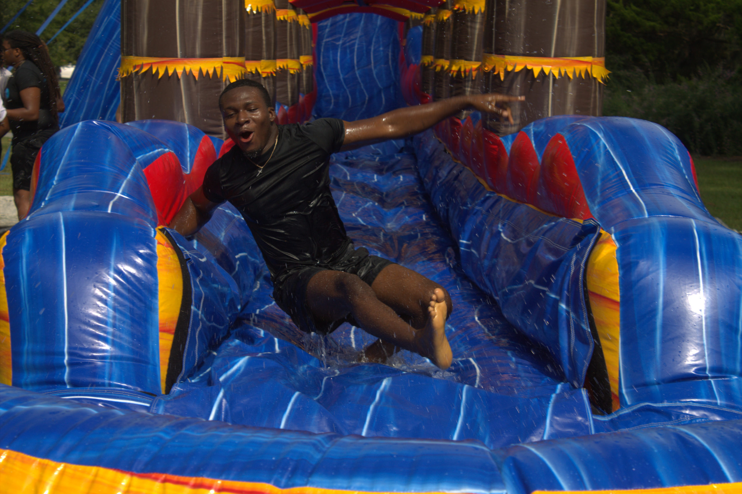 A group of roughly 15 students took on the waterslide time and time again. 

Pictured: Precious Adeykinka