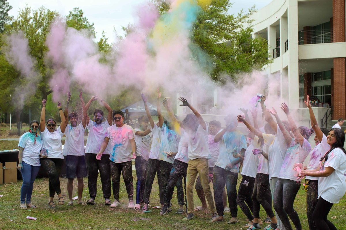 March 26th, 2024 - Armstrong Students throwing powder in the air celebrating HOLI.