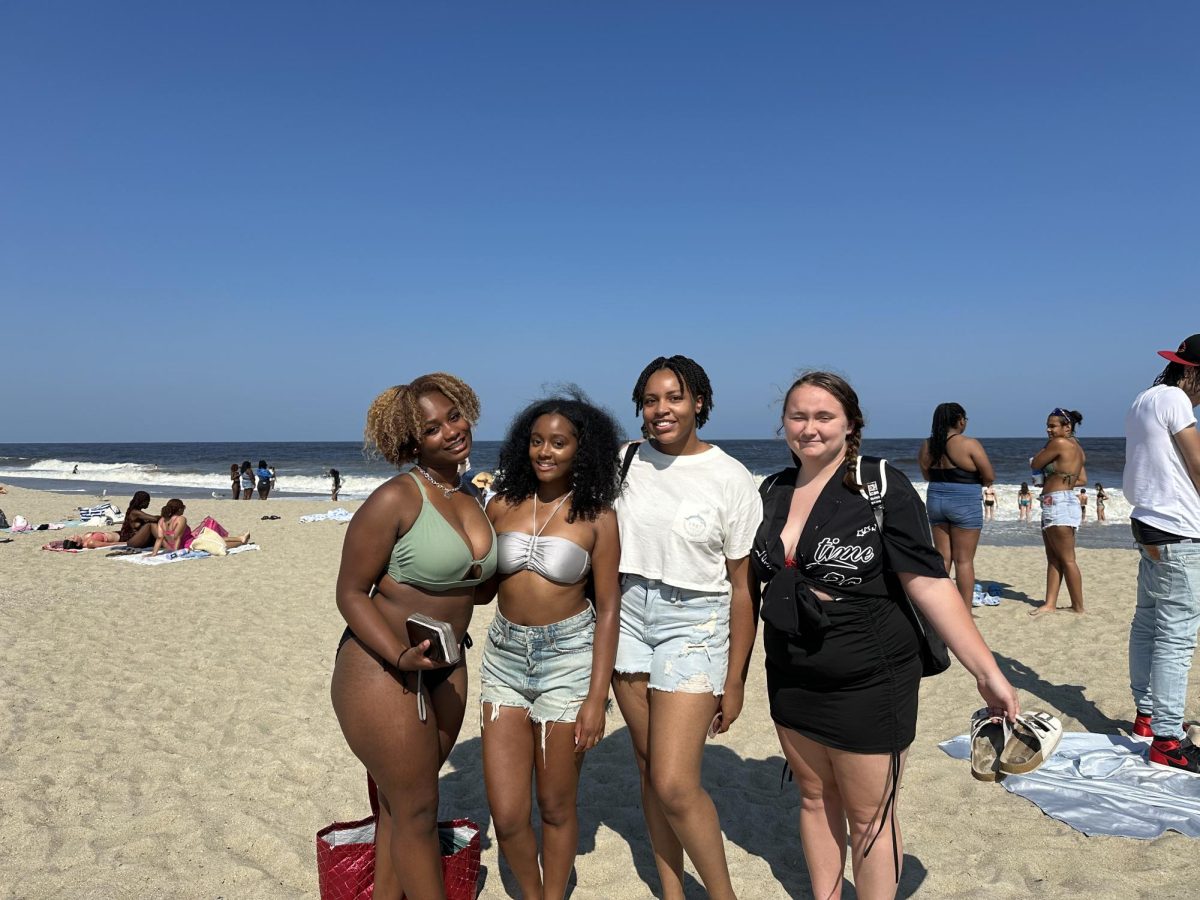 Students pose and smile for a photo