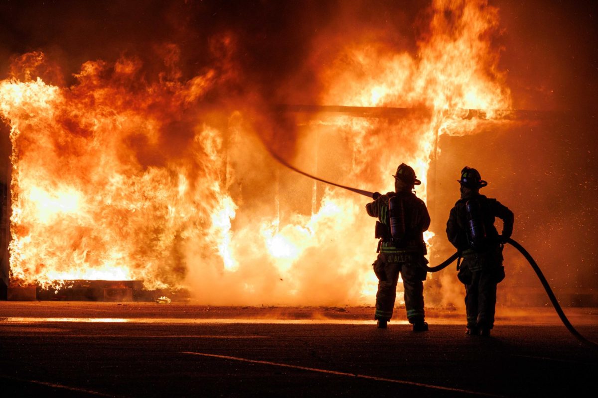 Firefighters extinguishing the flames 