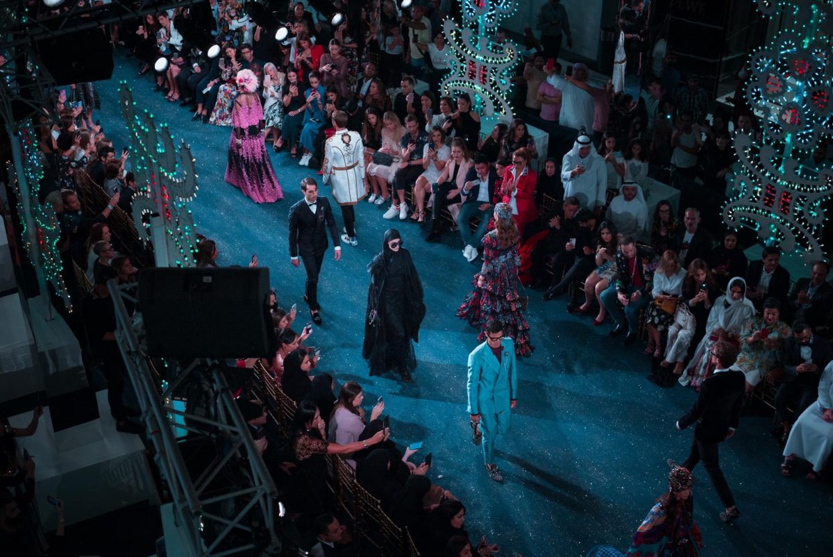 Fashion models strutting down a runway