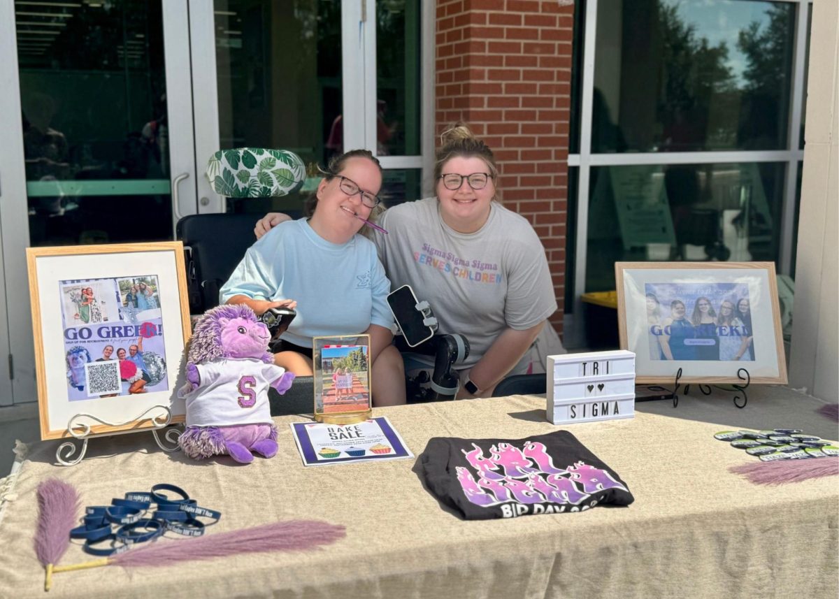 Caroline O’Brien and Isabelle Arnold tabling at “Real Eagles Don’t Haze: Wear It Wednesday”