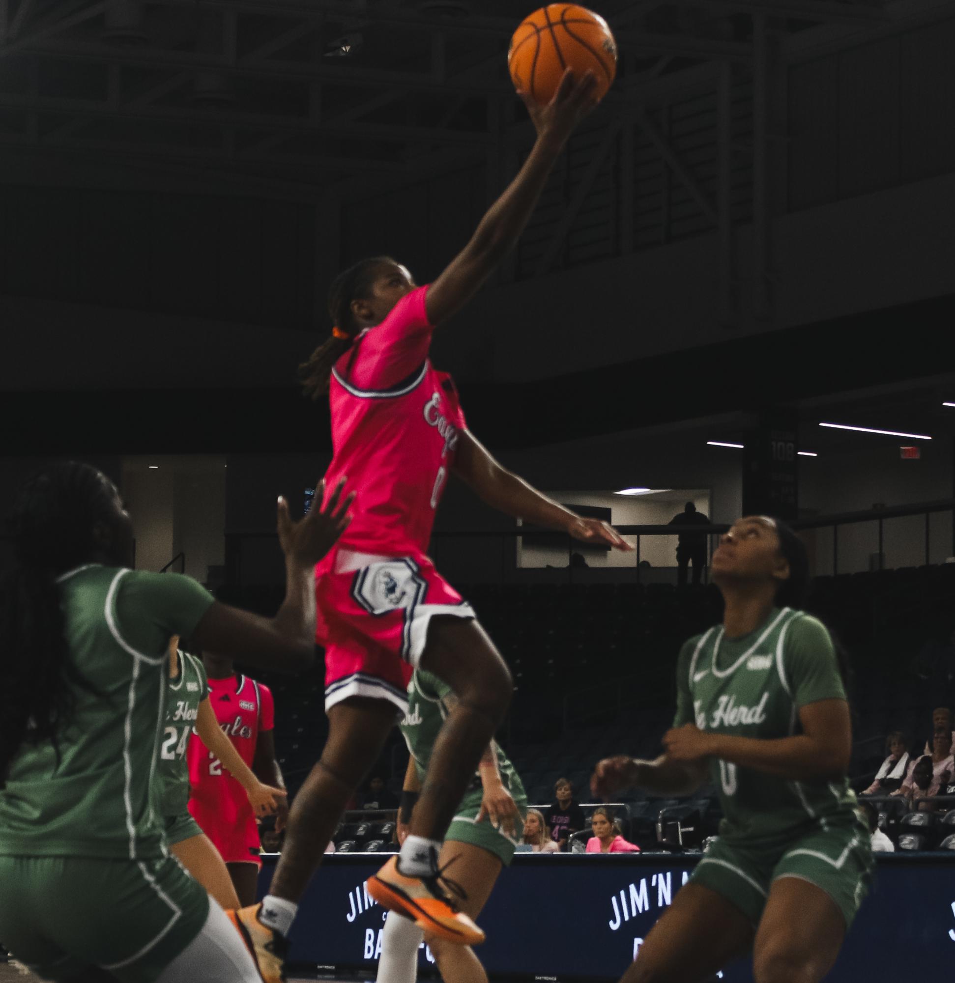Women's Basketball Secures Milestone Victory Against Marshall